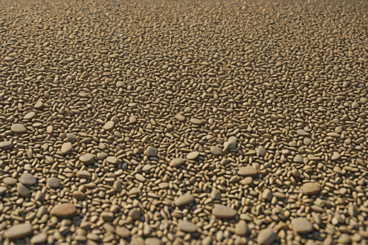 Pea Gravel Bordering and Linear Breaks: - Concrete Slab Patio Makeover Ideas